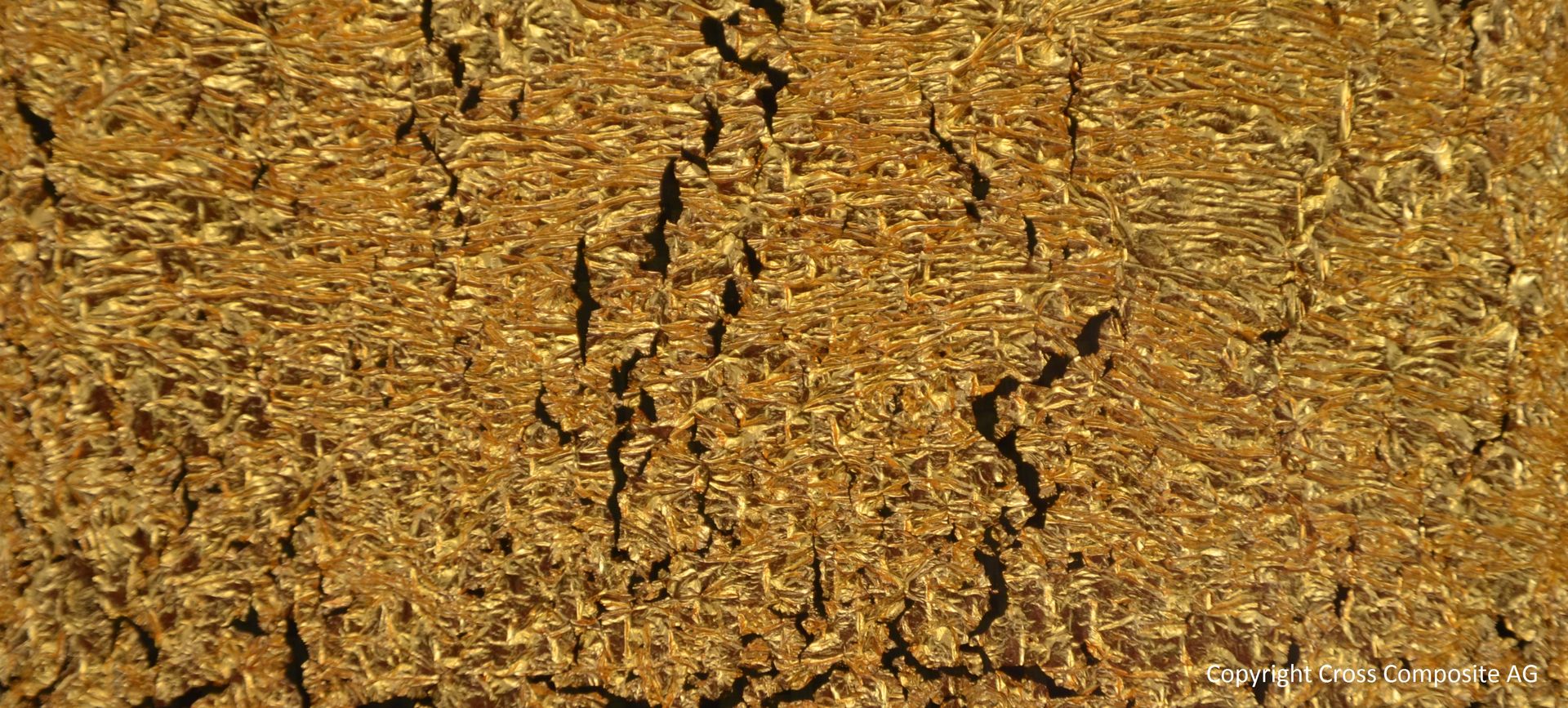 Nahaufnahme von thermoplastischem Faserverbundwerkstoff aus Gold-Carbon Composites